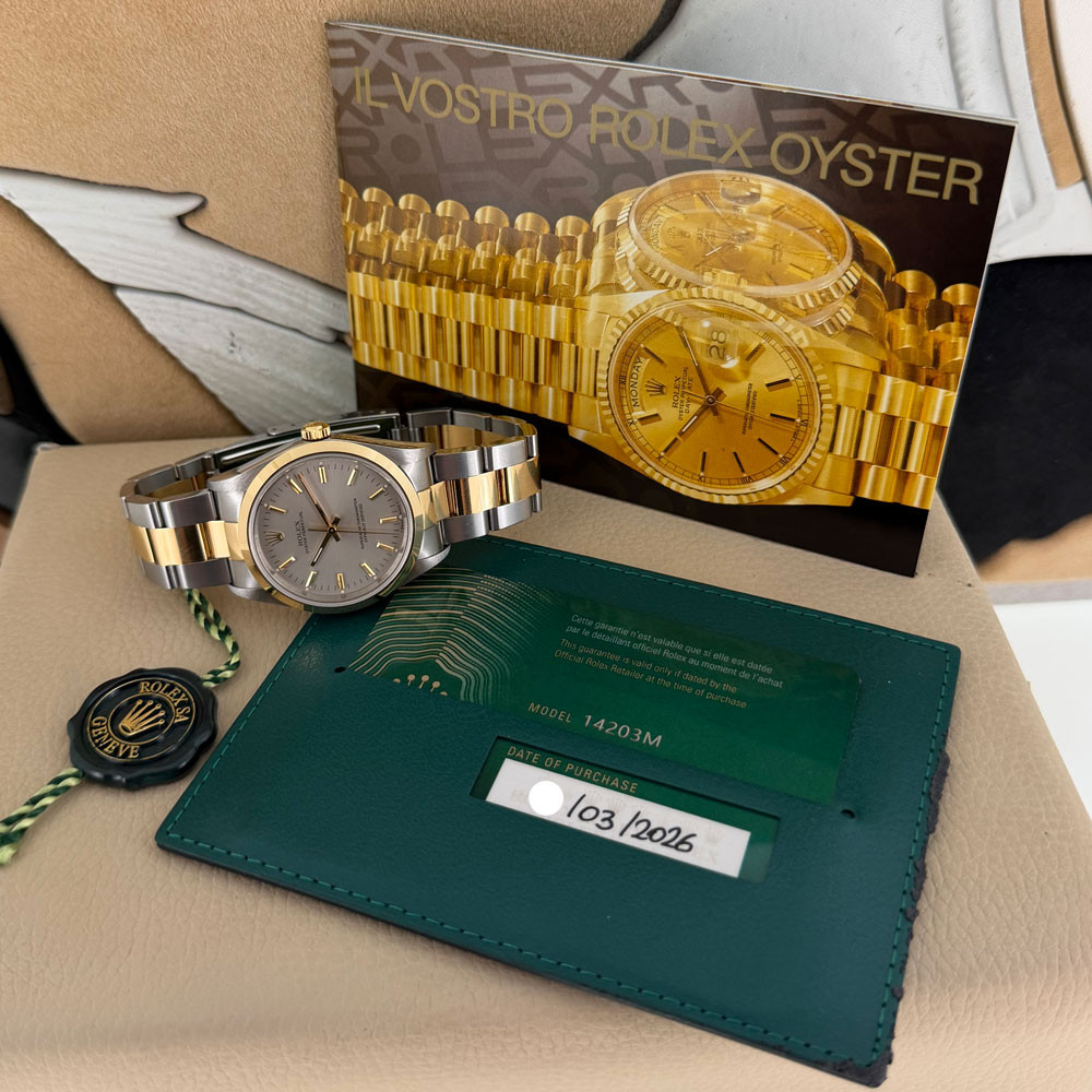 Rolex Oyster Perpetual NOS 14203 1