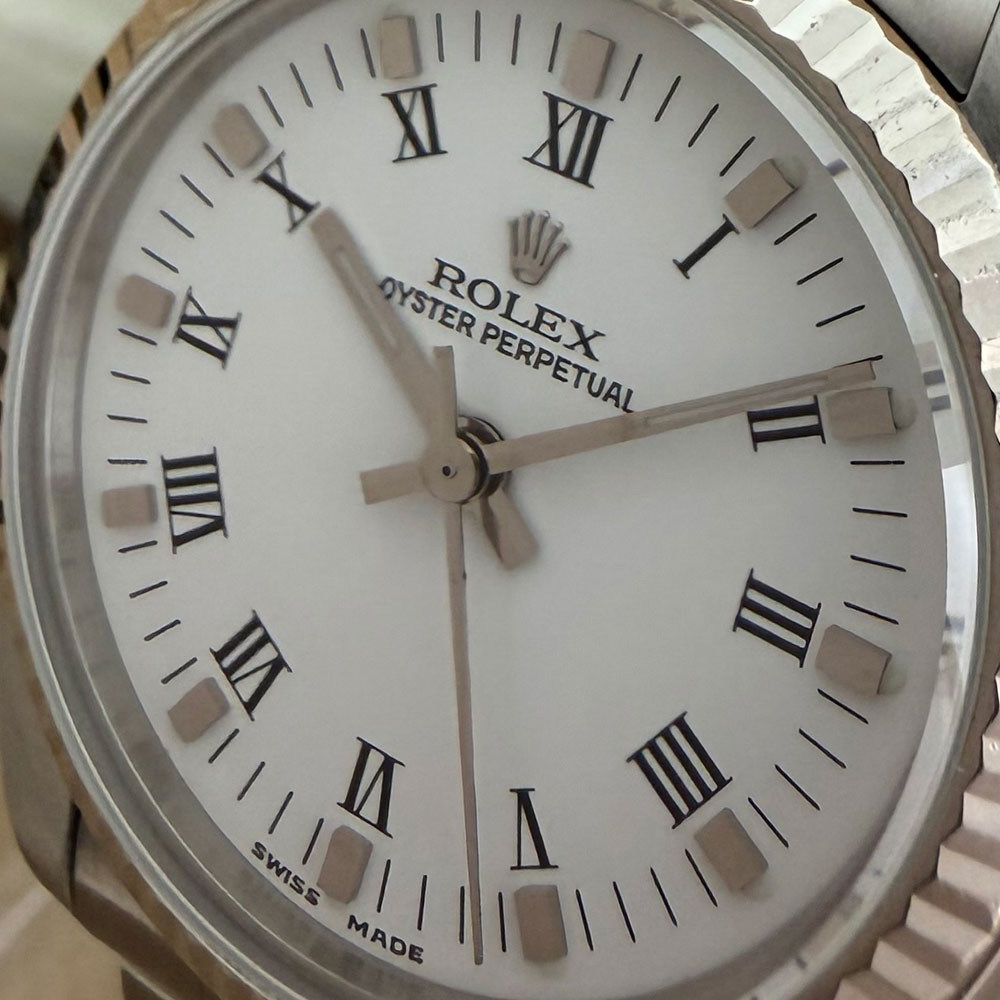 Rolex Oyster Perpetual 77014 4