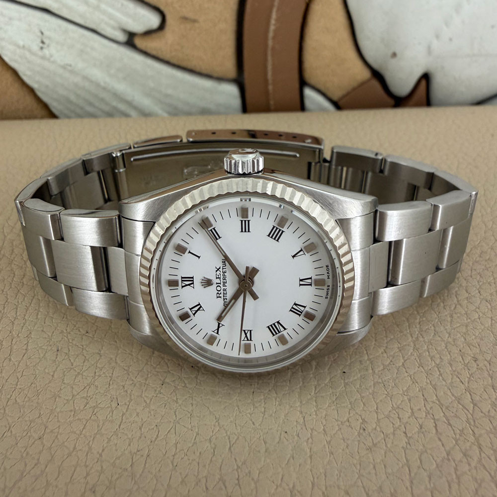 Rolex Oyster Perpetual 77014 6