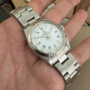 Rolex Oyster Perpetual 77014 9